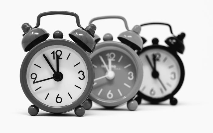 Vintage alarm clocks photographed in black and white