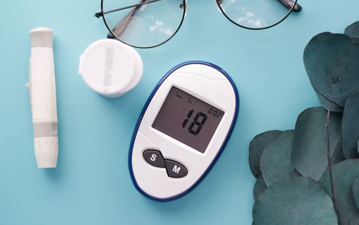 Close-up of a handheld glucose meter